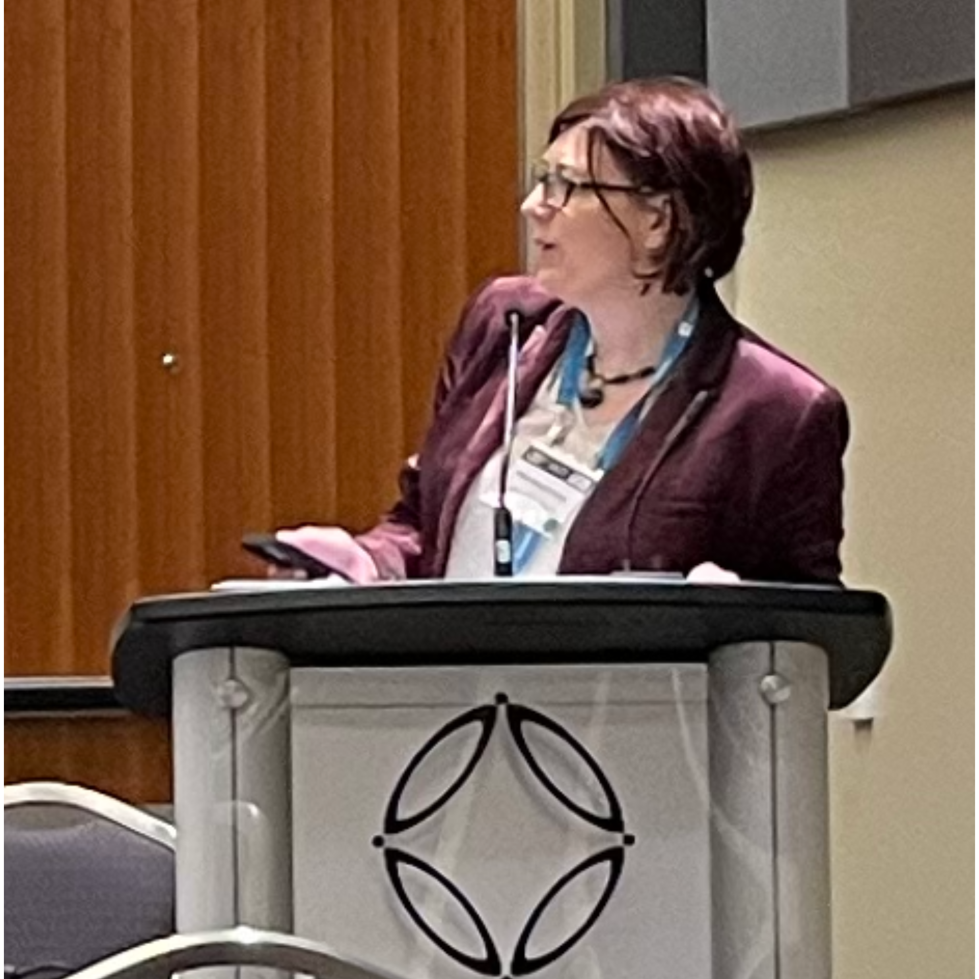 Erica Speaking at a conference